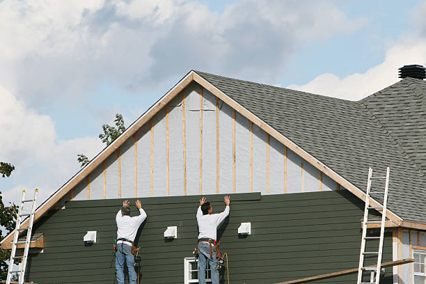 Professional Siding technician working in Charlestown, IN
